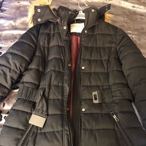 A women’s Tommy Hilfiger coat and Addias dress.